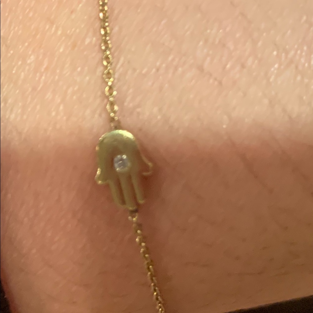 Small 18k gold with tiny diamond hamsa bracelet